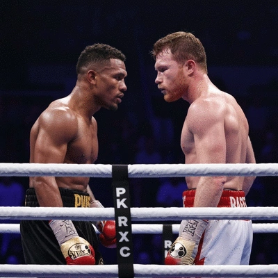 Terence Crawford and Canelo Alvarez facing off in boxing ring, dynamic lighting